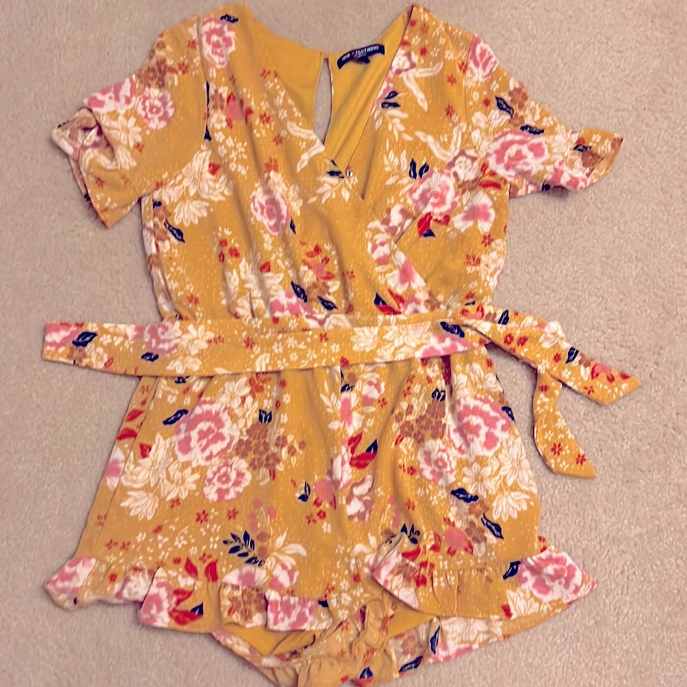 One clothing yellow/gold one piece romper.